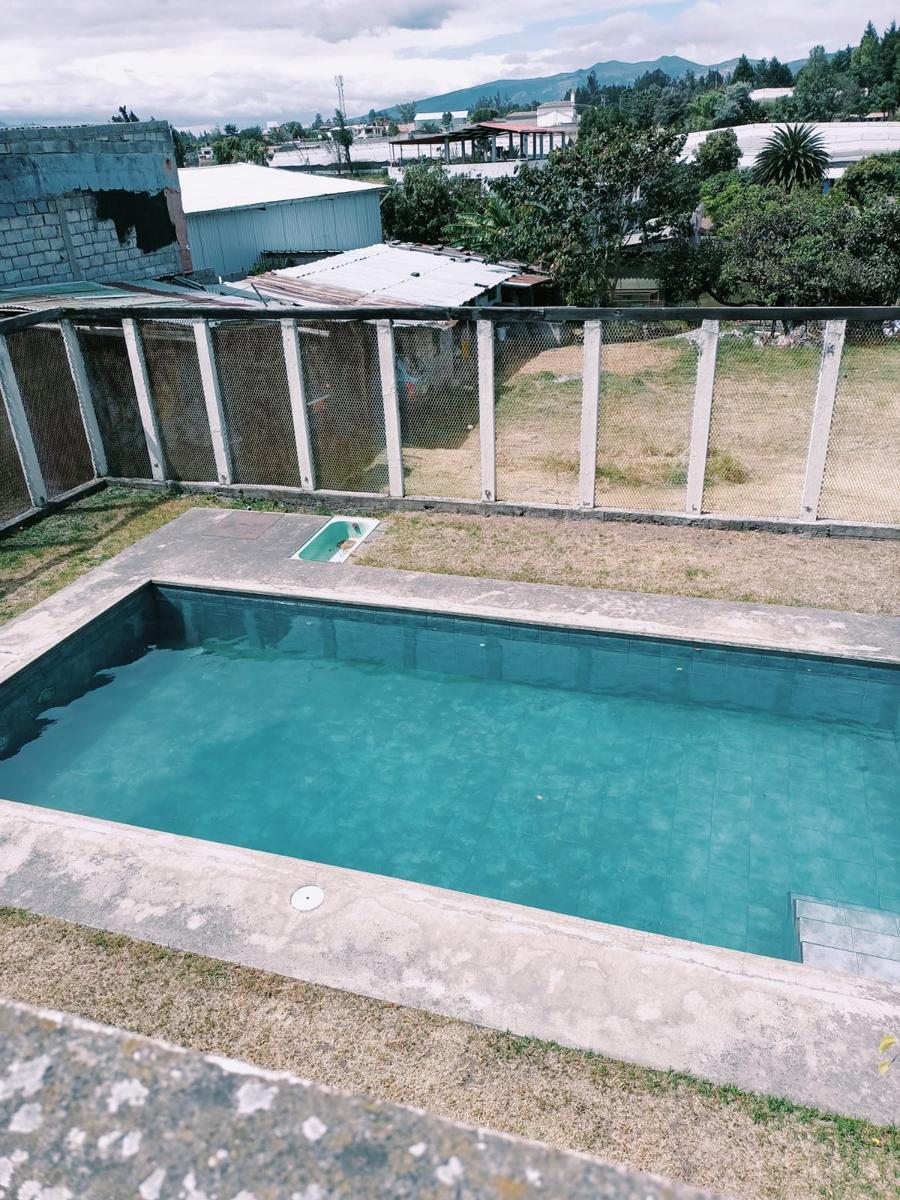 Terreno en venta con casa, piscina en Chiche Obraje Puembo